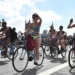 People take part in the World Naked Bike Ride 2017 across Westminster Bridge in central London on June 10, 2017.
Participants ride naked across London to raise awareness of cyclists on the roads in this annual event. / AFP PHOTO / Justin TALLIS